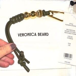 Veronica Beard Olive and Gold Embellished bag charm color is “cypress”